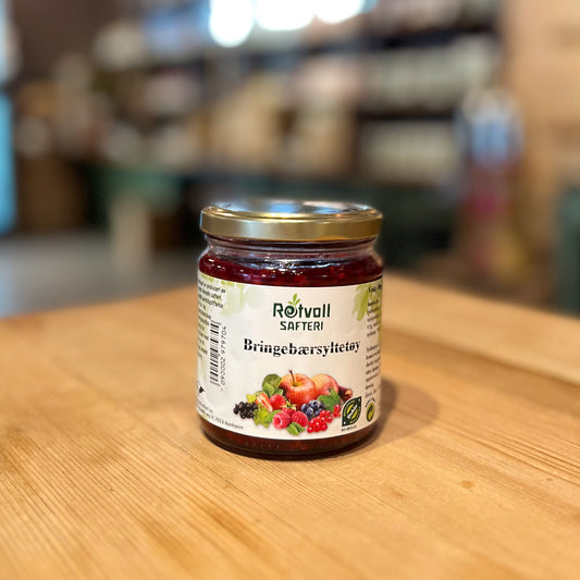 Glass med økologisk bringebærsyltetøy. Laget av norske bær, uten kunstig tilsetning.